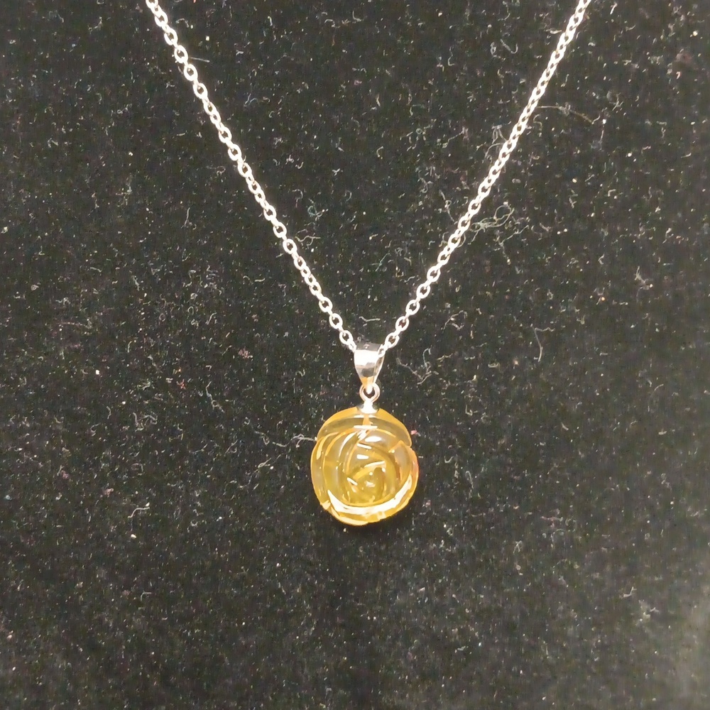Baltic Amber Carved Flower Pendant in Sterling Silver with Stainless Steel